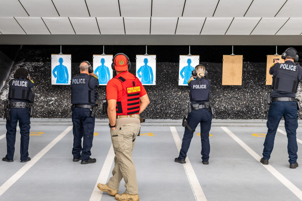 Plantation firearms range with firearms instructor and training officers.
