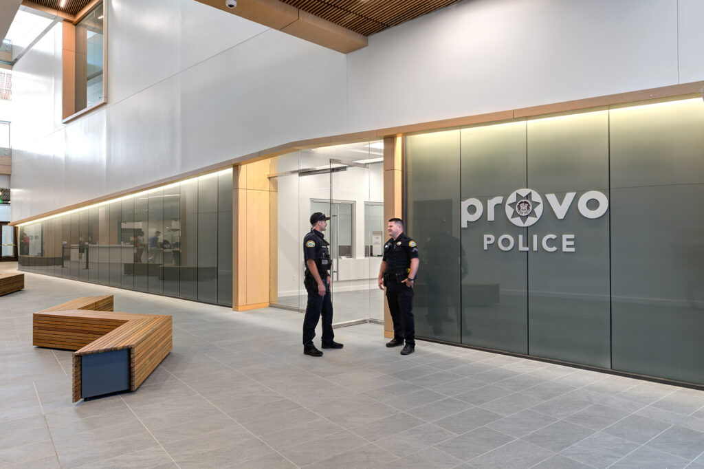 Provo Public Safety and City Center front lobby with two police officers.